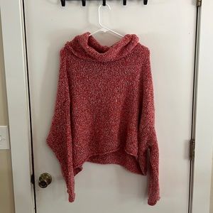 Free people bright pink loose turtle neck sweater.